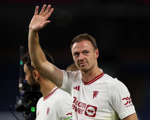 Jonny Evans of Manchester United waves to the fans at full time during the Premier League match between Burnley FC and Manchester United at Turf Moor in Burnley, England. (Photo by Matt McNulty/Getty Images)