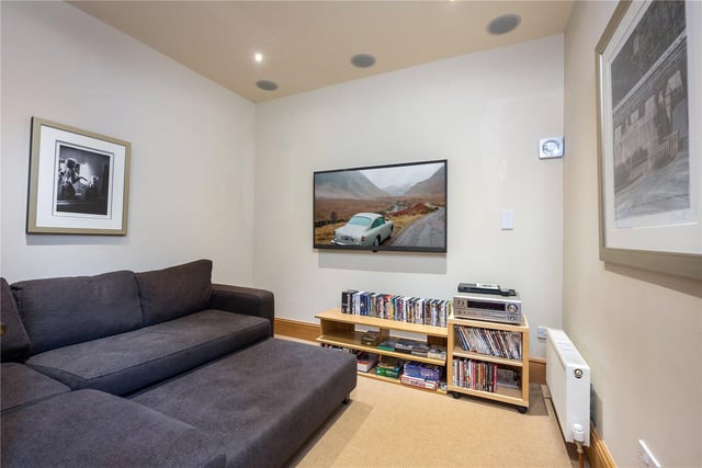 The living area comes complete with a entertainment centre, featuring a range of films and games.