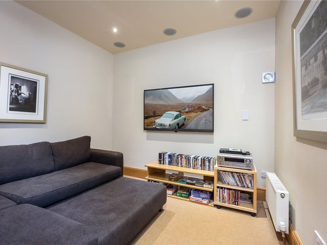 The living area comes complete with a entertainment centre, featuring a range of films and games.