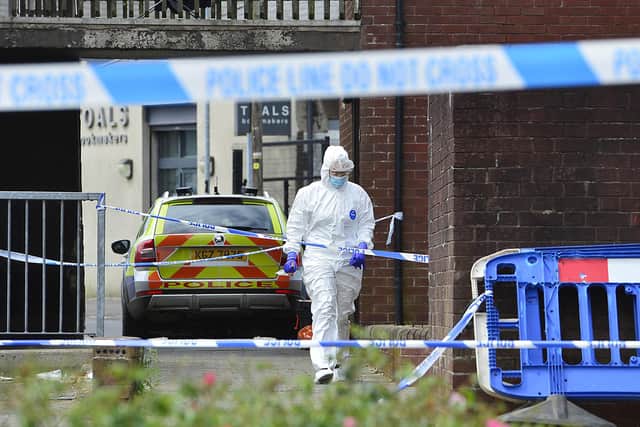 Police and Forensic officers attended a flat in James Street in Ballymena. Picture By: Arthur Allison/Pacemaker Press.