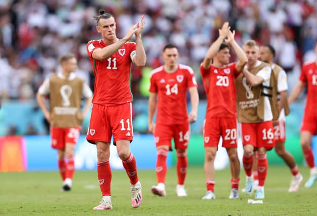 Wales' Gareth Bale applauds fans after the 0-2 loss during the FIFA World Cup Qatar 2022 Group B match between Wales and Iran at Ahmad Bin Ali Stadium in Doha. (Photo by Julian Finney/Getty Images)