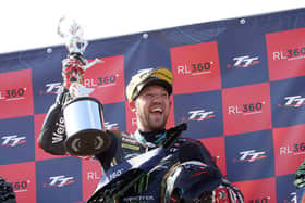 Peter Hickman celebrates winning the opening Superstock TT on the Monster Energy by FHO Racing BMW for his 10th victory on Tuesday