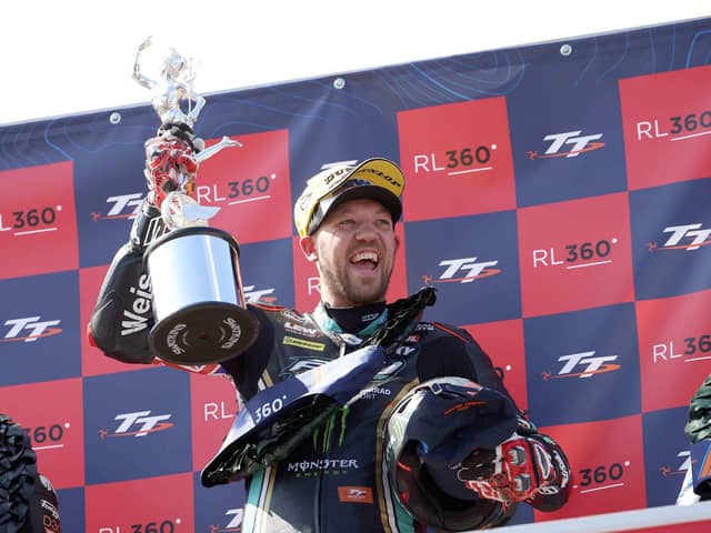 Peter Hickman celebrates winning the opening Superstock TT on the Monster Energy by FHO Racing BMW for his 10th victory on Tuesday