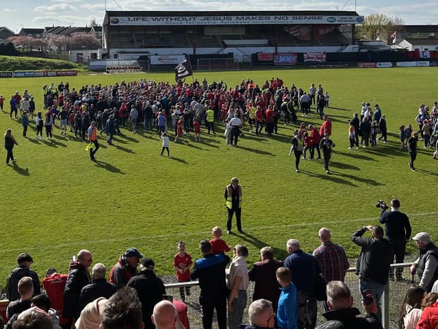 Portadown celebrations after the final whistle confirmed promotion back up to the Premiership as Championship champions with a 1-1 draw at Shamrock Park against Dundela. (Photo by National World)