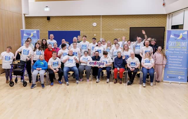 Energia representative James McBrearty (centre) pictured with members of Skyzdalimit Performing Arts.