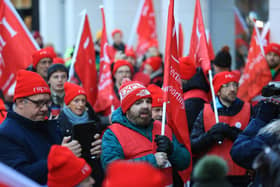 Public sector workers from Northern Ireland Public Service Alliance (NIPSA) on the picket line outside the Northern Ireland Office (NIO) at Erskine House, Belfast, as an estimated 150,000 workers take part in walkouts over pay across Northern Ireland.