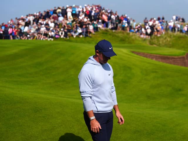 Rory McIlroymakes his way off t he 18th green on day two of the Amgen Irish Open at Trump International Golf Links Ireland in Doonbeg