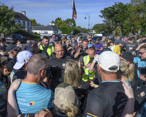 Rory Best, former Ireland and Ulster rugby captain, and his team of 21 business leader walkers, cross the finish line of Rory’s latest walking challenge for Cancer Fund for Children in Cong, Co Mayo.