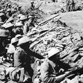 British infantrymen occupying a shallow trench before an advance during the Battle of the Somme