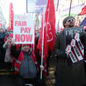 Public sector workers held a mass rally at Belfast City Hall on Thursday