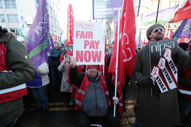 Public sector workers held a mass rally at Belfast City Hall on Thursday