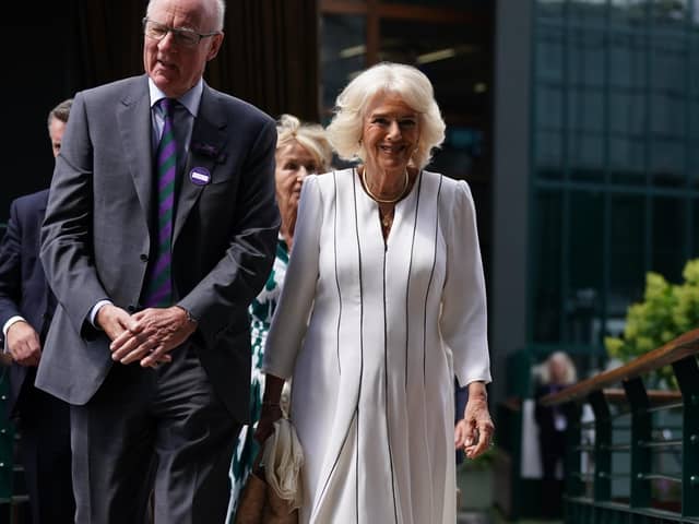 Queen Camilla with AELTC chairman, Ian Hewitt as she arrives for her visit on day ten of the 2023 Wimbledon Championships at the All England Lawn Tennis and Croquet Club in Wimbledon