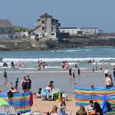 A flashback to Portrush beach in July: Northern Ireland is to see unusually warm weather for October, with temperatures reaching the high teens this weekend.