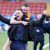 Dungannon Swifts manager Dean Shiels celebrates as Joseph Moore scores in the dying seconds of the game to defeat Cliftonville 2-1