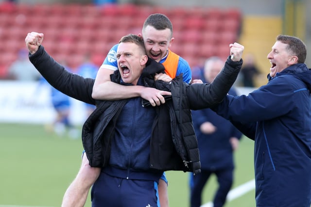 Dungannon Swifts manager Dean Shiels celebrates as Joseph Moore scores in the dying seconds of the game to defeat Cliftonville 2-1