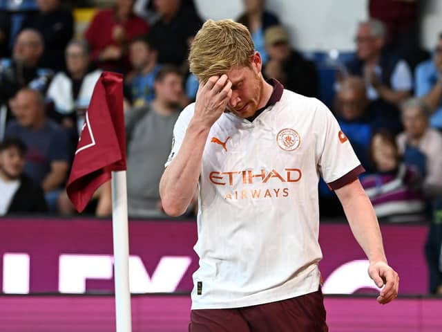 Manchester City's Kevin De Bruyne reacts after sustaining an injury during the Premier League match against Burnley at Turf Moor
