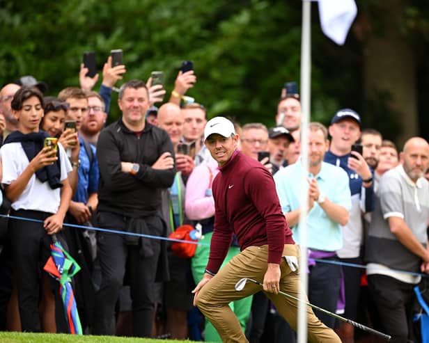 Northern Ireland's Rory McIlroy reacts after chipping onto the 14th green during the closing BMW PGA Championship round at Wentworth. (Photo by Ross Kinnaird/Getty Images)