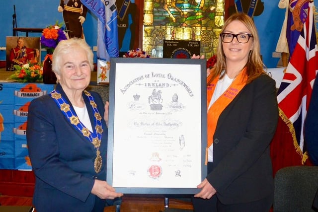 Grand Mistress, Sister Joan Beggs and Worshipful Mistress Leanne Abernethy with the Warrant for Daughters of Dalriada WLOL 234