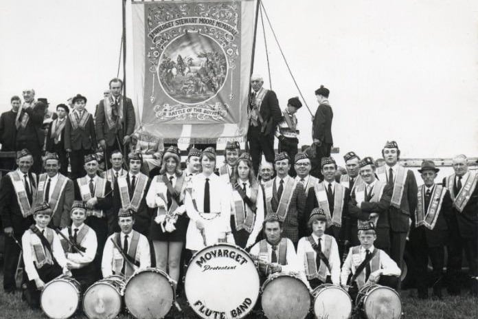 Moyarget lodge unfurled another new banner on the 8th July 1972 in a field owned by Mr William Smyth. Pictured are LOL 1196 Lodge officers for 1972 were W.M., Bro. James Mitchell, D.M., Bro. Robert Craig, Sec., Bro. Alex Brown, Treas., Bro. Alex McLernon and Chap., Bro. David McMullan