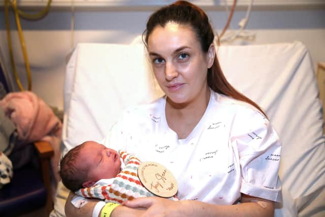 Baby Joey Slane, born at 12.57am on New Year's Day, weighing 7 pounds and three ounces with proud mum Caoimhe Slane. Photograph by Declan Roughan / Press Eye