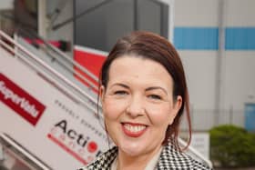 Action Cancer’s new patron Lisa McGee pictured outside the charity’s Big Bus which travels to 200 locations every year offering breast screenings to local women