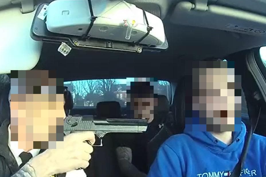 Man due in court after online footage shows 'taxi driver threatening passenger with gun'