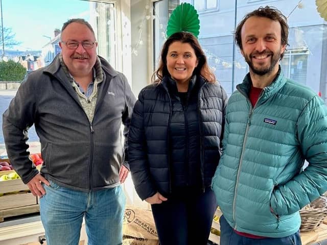 Adrian Hack of Carrick Greengrocers, left, is pictured with Portia Woods and Tim Davies from Jubilee Farm