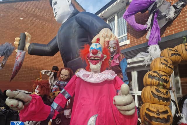 Killer clowns and horror stars of the silver screen are among those currently haunting Lynn's front garden. Photo: Iain Gray/News Letter