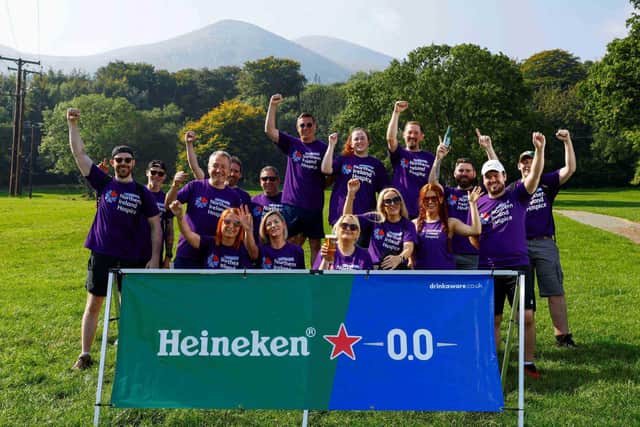 A 15-strong team from Craigavon-based United Wines climbed Slieve Donard mountain in Newcastle to set a new record for serving the highest pint of Heineken® in Northern Ireland, in aid of the Northern Ireland Hospice. Staff from the leading drinks distributor completed the challenge to serve a pint of non-alcoholic Heineken 0.0 at the highest peak in Northern Ireland, raising £2,500 in the process, which was match funded by United Wines to provide a grand total of £5,000 for the charity which provides specialist palliative care to 4,000 patients every year