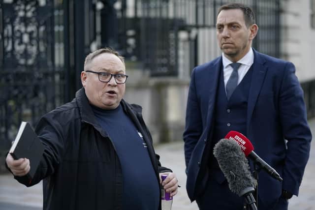 Neil Colwell (left) and solicitor Padraig O'Muirigh speak outside Belfast High Court following the inquest into the death of his brother Steven Colwell, who died aged 23 in April 2006 after police opened fire on the stolen BMW he was driving when he failed to stop at a checkpoint in Ballynahinch. Photo: Niall Carson/PA Wire