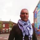Pat Sheehan at the Bobby Sands mural, Falls Road, Belfast