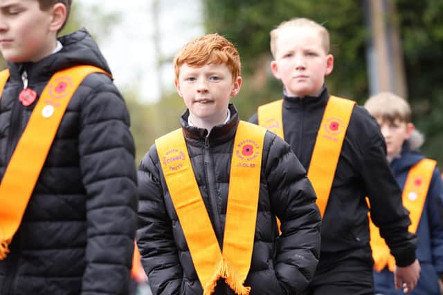 PACEMAKER, BELFAST, 2/4/2024: Members of Bushmills Blues and Royals Junior LOL No.50 on the march during the Junior Orange parade in Ballymoney, Co. Antrim today.PICTURE BY STEPHEN DAVISON
