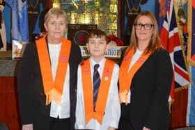 Celebrating three generations of Orangeism,  Junior Chaplain Alfie Armstrong from Bushmills Blues & Royals JLOL 50 is proudly pictured with his mum, Worshipful Mistress Leanne Abernethy from Daughters of Dalriada WLOL 234 and granny Sister Gloria Abernethy after the installation of the new Ladies Orange Lodge