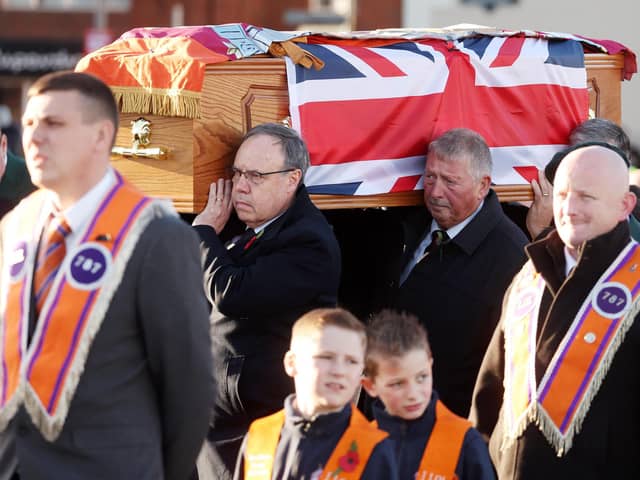 Funeral for DUP Councillor David Hilditch at Carrickfergus, Co. Antrim.  Mr Hildtich was a former MLA, twice-serving Mayor of Carrickfergus Borough Council and Director of Carrick Rangers Football Club. The DUP’s Nigel Dodds and Sammy Wilson carry the coffin. PIC: Jonathan Porter/PressEye