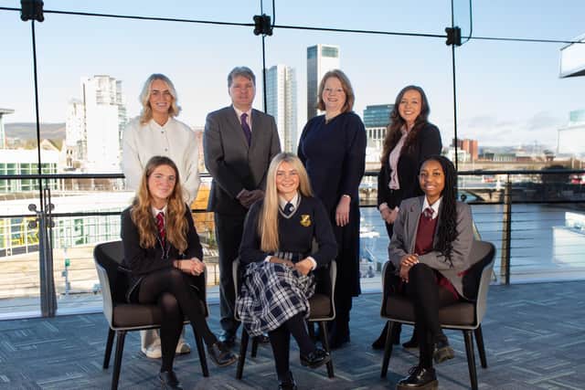 Ella Rourke, executive assistant at SistersIN, SistersIN founder Peter Dobbin, Julia Corkey, chief executive of ICC Belfast, Eimear Hone, senior association account manager at ICC Belfast and SistersIN students Romy, Zara and Maka