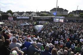 People attend a community event in support of the Garvaghy Road residents in the Drumcree parade dispute on Saturday afternoon