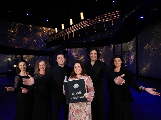 Eimear Kearney, associate commercial director at Titanic Belfast is pictured with Cappella Caeciliana’s musical director Michael Quinn, chairman David McCartney and members of the choir as they launch Some Distant Shore