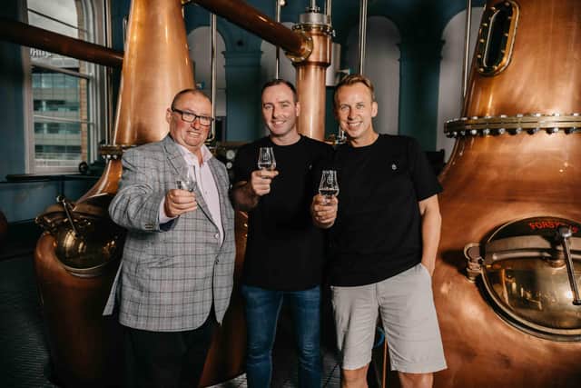 Cheers...Titanic Distillers directors Peter Lavery and Stephen Symington joined head distiller Damien Rafferty to celebrate as production started at Belfast’s first working whiskey distillery since the days of prohibition in the 1930s