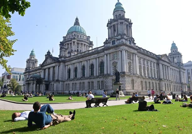 A DUP bid to defeat plans for Irish street signs has been defeated in a vote at Belfast City Hall