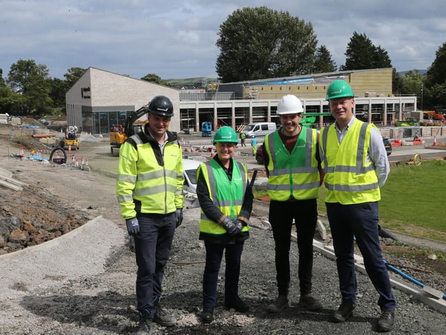 Alan McCullough, project manager at Graham, councillor Dawn Huggins, Mayor of Causeway Coast and Glens, Jake Mailey, Capital Projects Officer at Causeway Coast and Glens Borough Council and Brian Tohill, general manager (Sport & Wellbeing), during a visit to the new Ballycastle Leisure Centre