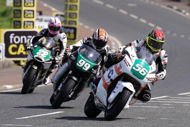 Adam McLean (56) on his way to a podium finish in the Supertwin class at the 2023 North West 200