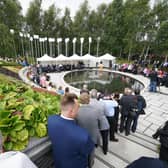 People attended a service to mark the 25th anniversary of the bombing that devastated Omagh in 1998, at the Memorial Gardens in Omagh, Co Tyrone, on Sunday