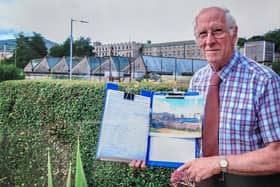 Bessbrook resident John Davis ay Bessbrook Mill with the petition.