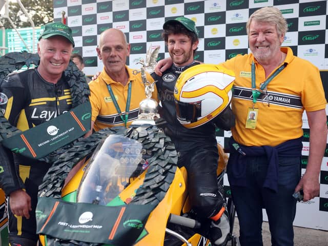 Lightweight Manx Grand Prix race winner Mike Browne and runner-up Ian Lougher with LayLaw Racing team owner Gerry Lawlor and Eddie Laycock