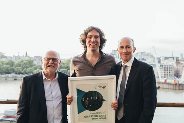 In 2018, Gary Lightbody of Snow Patrol (centre) was presented with PPL's 'Most Played Award' by John Smith OBE (left) and Peter Leathem OBE (right), chair and chief executive of PPL respectively. According to PPL’s airplay data, Snow Patrol’s anthem Chasing Cars is still the most played song this century on radio, TV and in public places