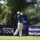 Northern Ireland's Rory McIlroy tees off on the ninth hole in the final round of the DP World India Championship. (Photo by Luke Walker/Getty images)