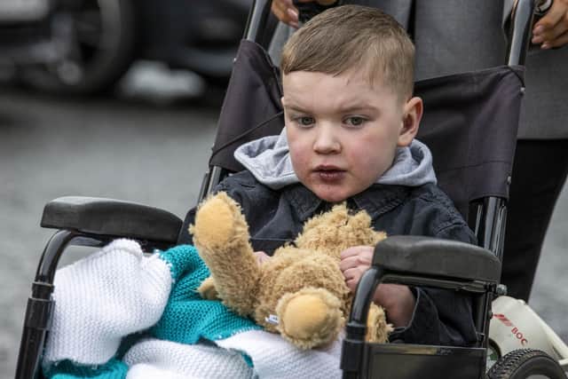 Six-year-old Daithi MacGabhann outside Hillsborough Castle in Northern Ireland, after he and his family met with Northern Ireland Secretary Chris Heaton-Harris to discuss delays implementing new organ donation laws in the region