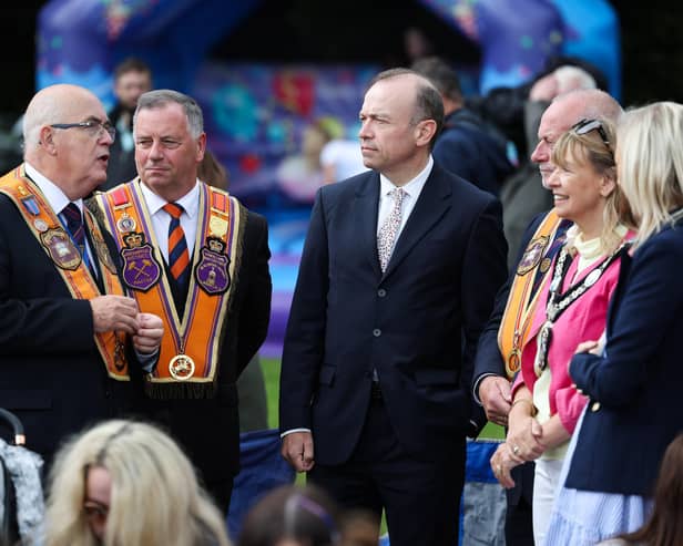 Press Eye - Belfast -  Northern Ireland - 12th July 2023 - 

Chris Heaton-Harris, Secretary of State for Northern Ireland along with Carla Lockhart MP and Margaret Tinsley, Mayor of Armagh, Banbridge Craigavon Borough Council watch the parade at Brownlow House with Orange Order officers at the County Armagh Twelfth Demonstration making itÕs way through Lurgan town centre to Brownlow House.
Eleven District Lodges were on parade, with a total of 150 Private Lodges and almost 5,000 orangemen.In addition, ladies from the Association of Loyal Orangewomen of Ireland took part, along with a number of Junior Boys and Junior Girls Lodges.The Co.  Almost 70 bands will accompany the lodges and some of the finest pipe, accordion, silver and flute Bands in the country will be on parade.

Photo by Kelvin Boyes  / Press Eye :Lurgan 12th