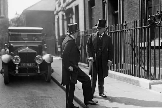 July 1919:  British Prime Minister Lloyd George (1863 - 1945) and Secretary for War and Air Winston Churchill (1874 - 1965) outside number 10 Downing Street, London.  (Photo by Topical Press Agency/Getty Images)