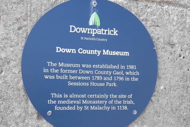 A plaque on the wall of the old Downpatrick Gaol which now houses the County Museum. Picture: Darryl Armitage